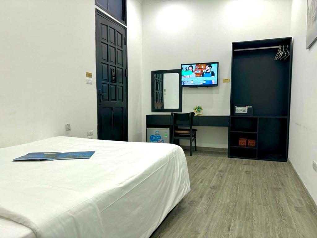 TV a/nebo společenská místnost v ubytování Hanoi Elpis Hotel