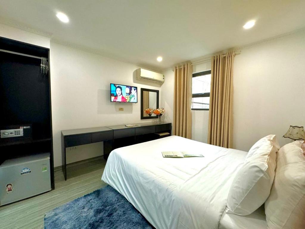 TV a/nebo společenská místnost v ubytování Hanoi Elpis Hotel