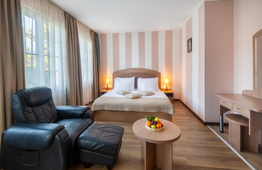 Postel nebo postele na pokoji v ubytování Hunguest Hotel Sun Resort