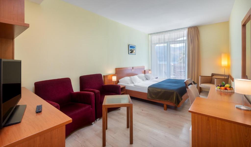 Postel nebo postele na pokoji v ubytování Hunguest Hotel Sun Resort