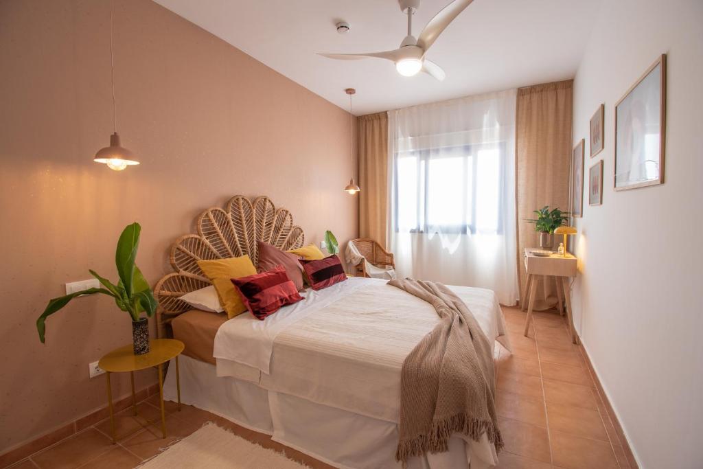 A bed or beds in a room at Book Jet - Costa Calma Sun & Pool
