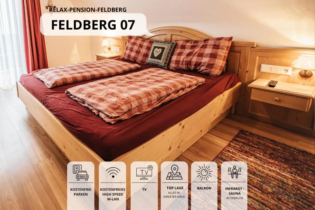 Postel nebo postele na pokoji v ubytování Forsters Schwarzwald Pension