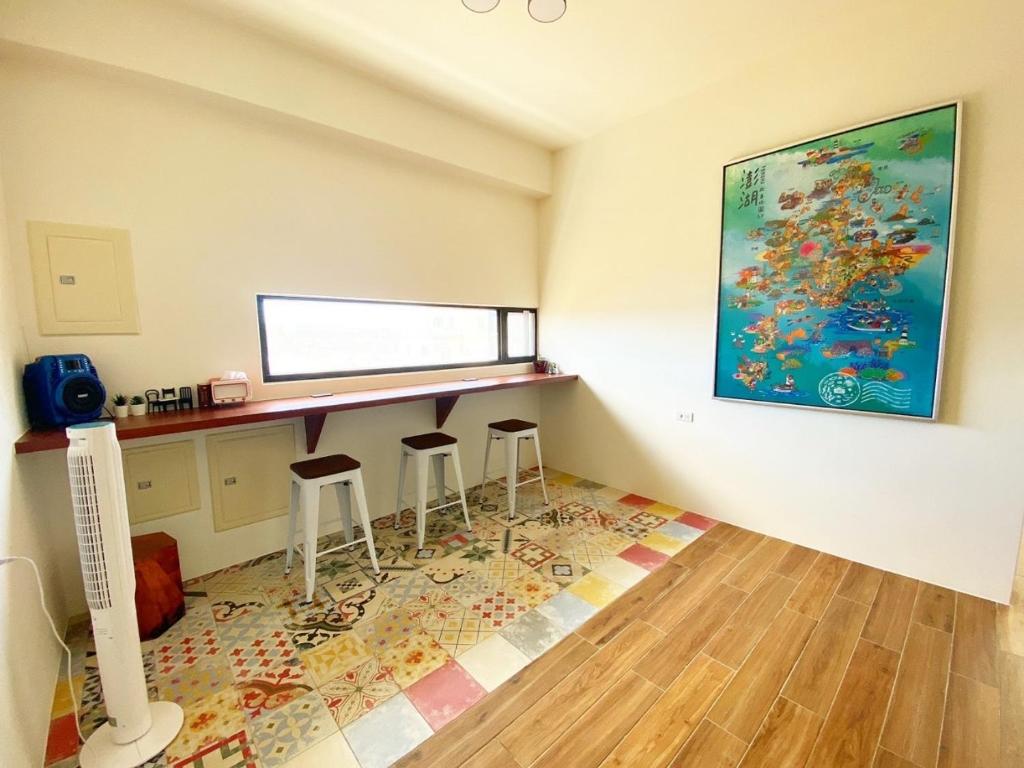 Fotografie z fotogalerie ubytování 澎湖卡米諾民宿ll住宿接駁ll貓店長 v destinaci Magong
