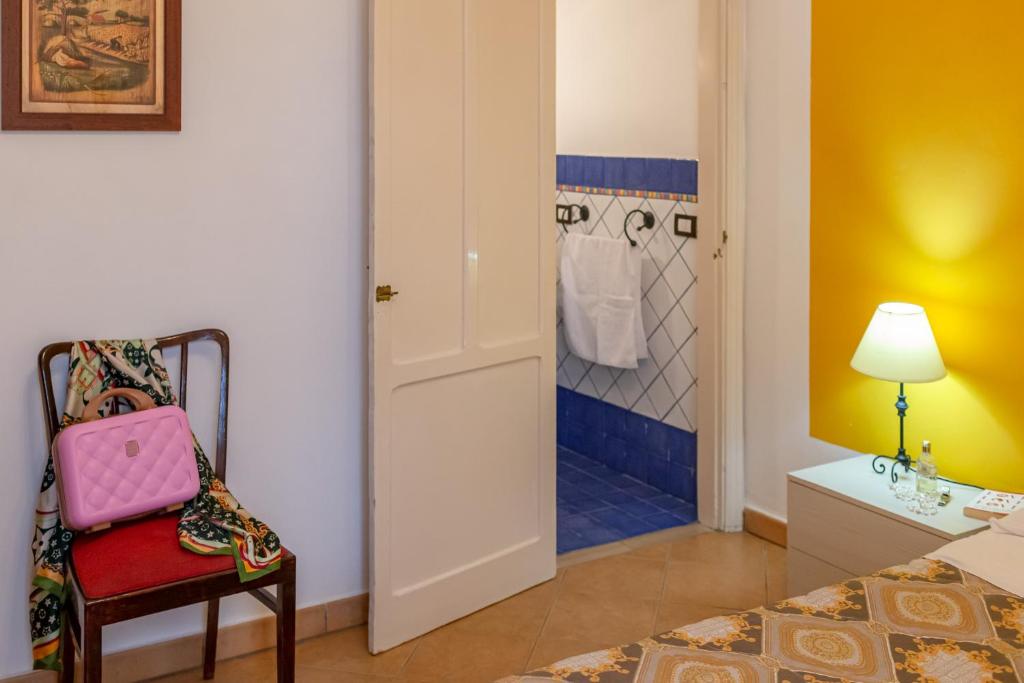 Postel nebo postele na pokoji v ubytování Case Vacanze Castellana Dream