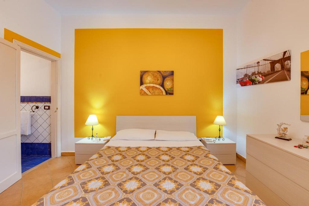 Postel nebo postele na pokoji v ubytování Case Vacanze Castellana Dream