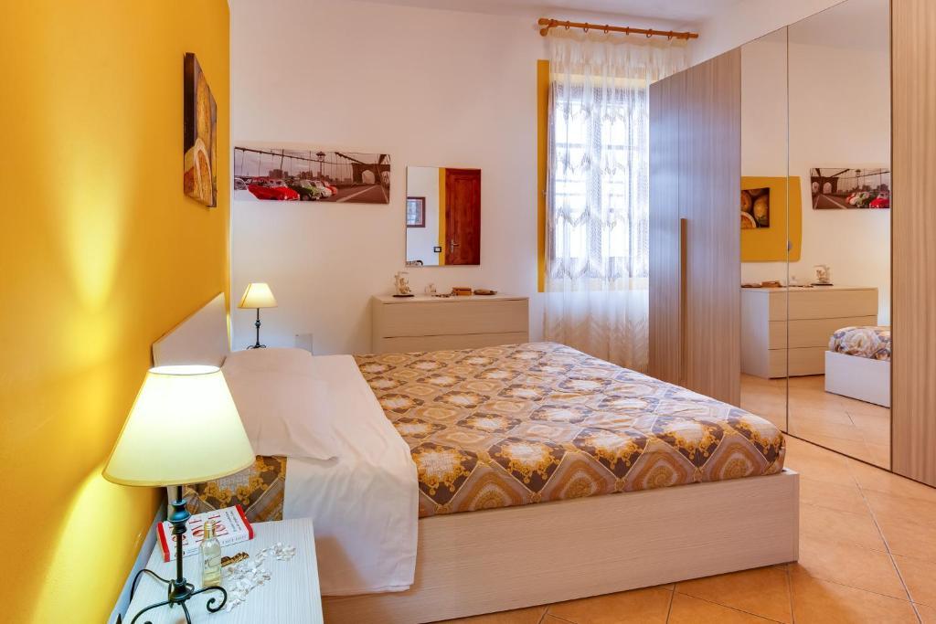 Postel nebo postele na pokoji v ubytování Case Vacanze Castellana Dream