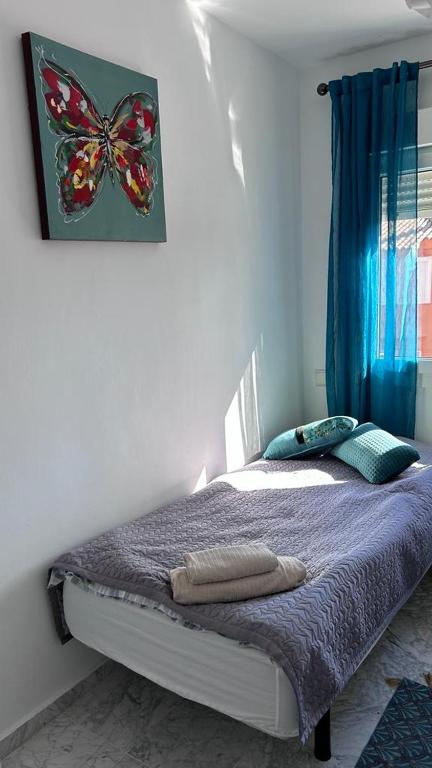 Posteľ alebo postele v izbe v ubytovaní Manilva Beach Casa de Pedro