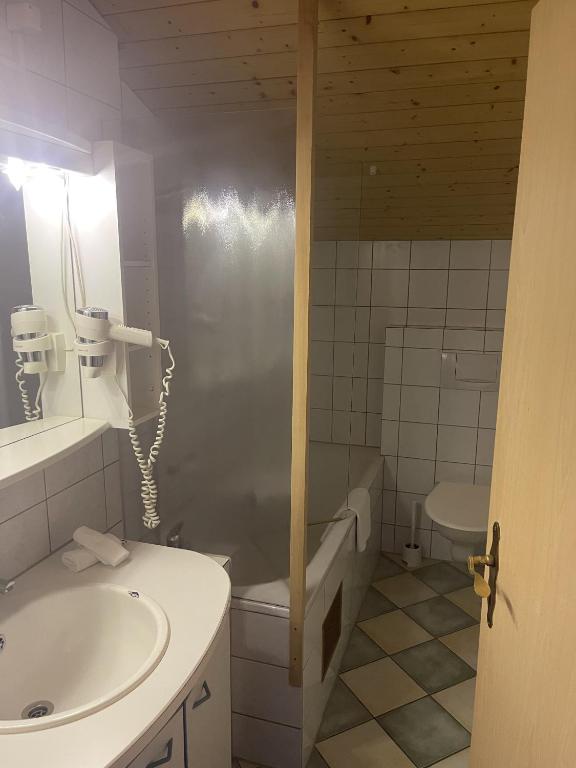 Koupelna v ubytování Chalet Hotel Adler AG