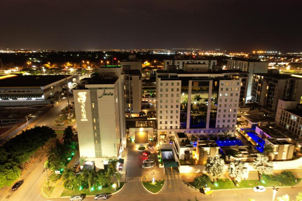 an aerial view of a city at night at Jade Hotel Brasília in Brasilia