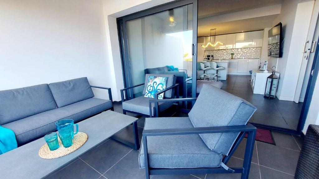Posezení v ubytování Casa Ana - Luxury pool apartment at Casilla de Costa