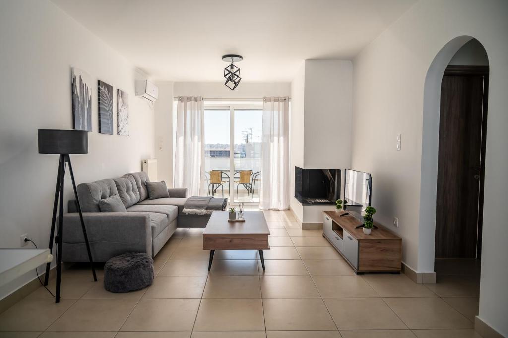 Posezení v ubytování Elegant apartment with breathtaking cityscape view (Drap_F5)