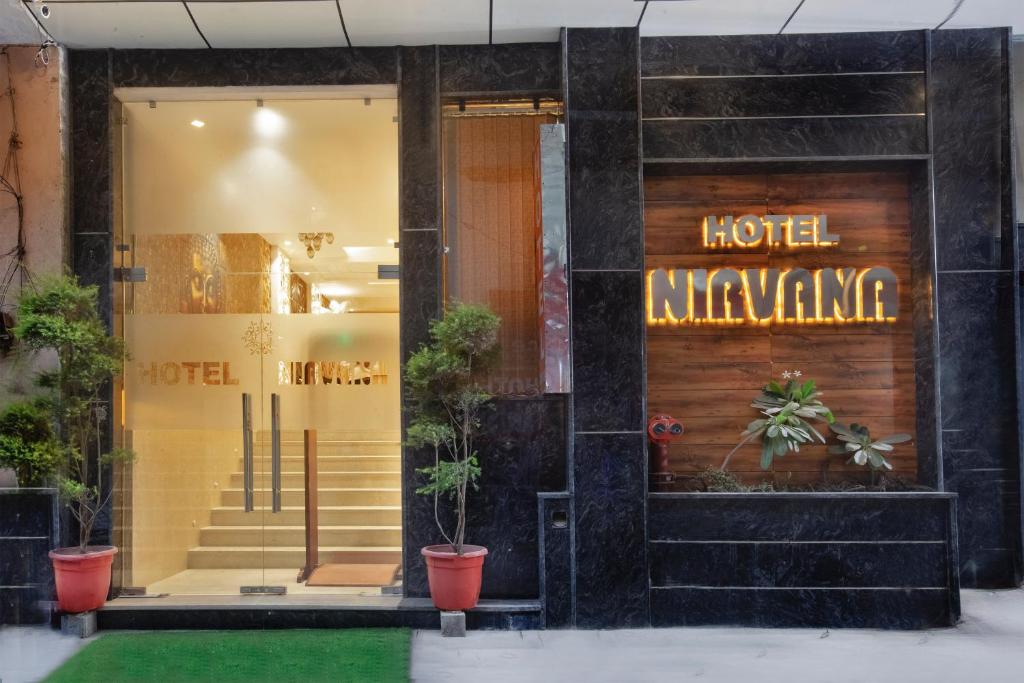a store front with a hotel interviewing sign on the door at The Nirvana Delhi Airport in New Delhi
