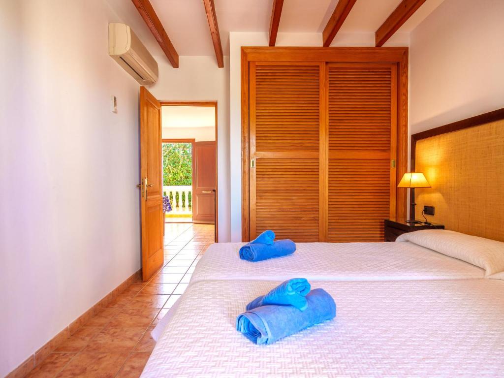Postel nebo postele na pokoji v ubytování Apartment Finca Can Corritx-2 by Interhome