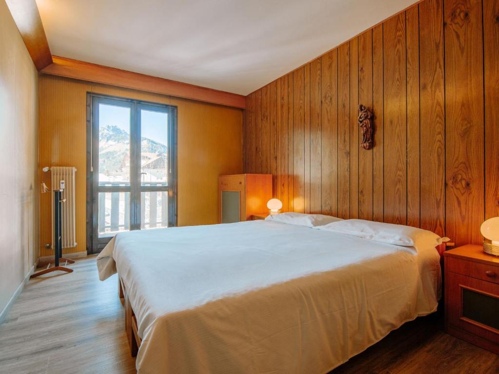 Posteľ alebo postele v izbe v ubytovaní Apartment Condominio al Parco-9 by Interhome