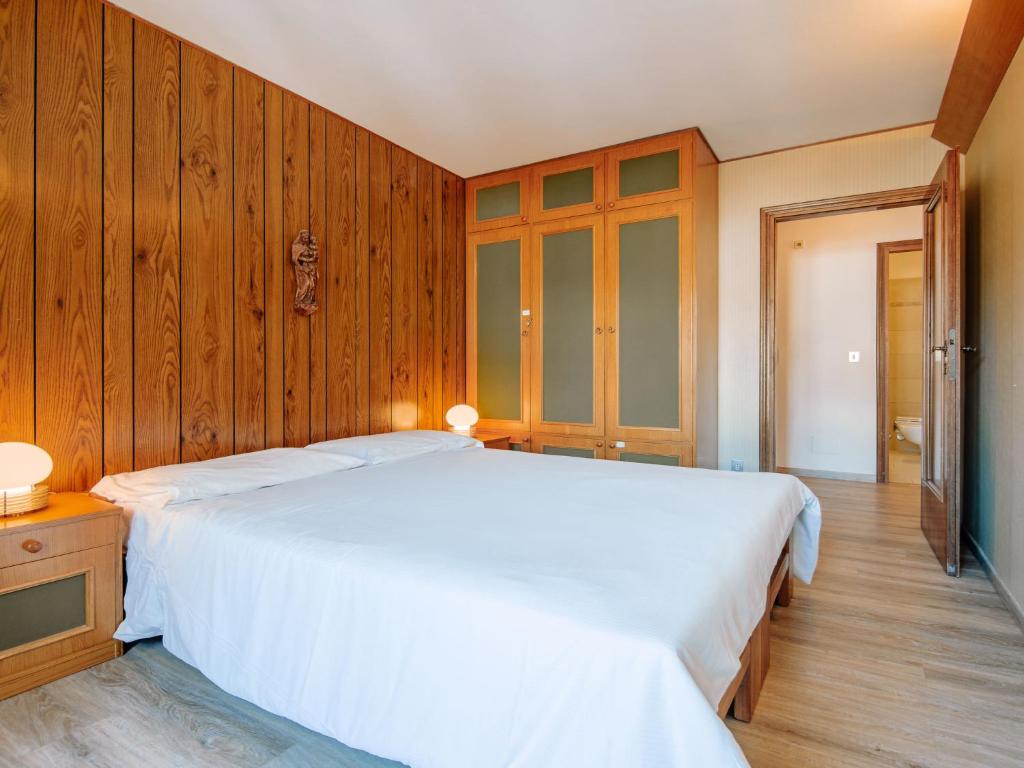 Posteľ alebo postele v izbe v ubytovaní Apartment Condominio al Parco-9 by Interhome