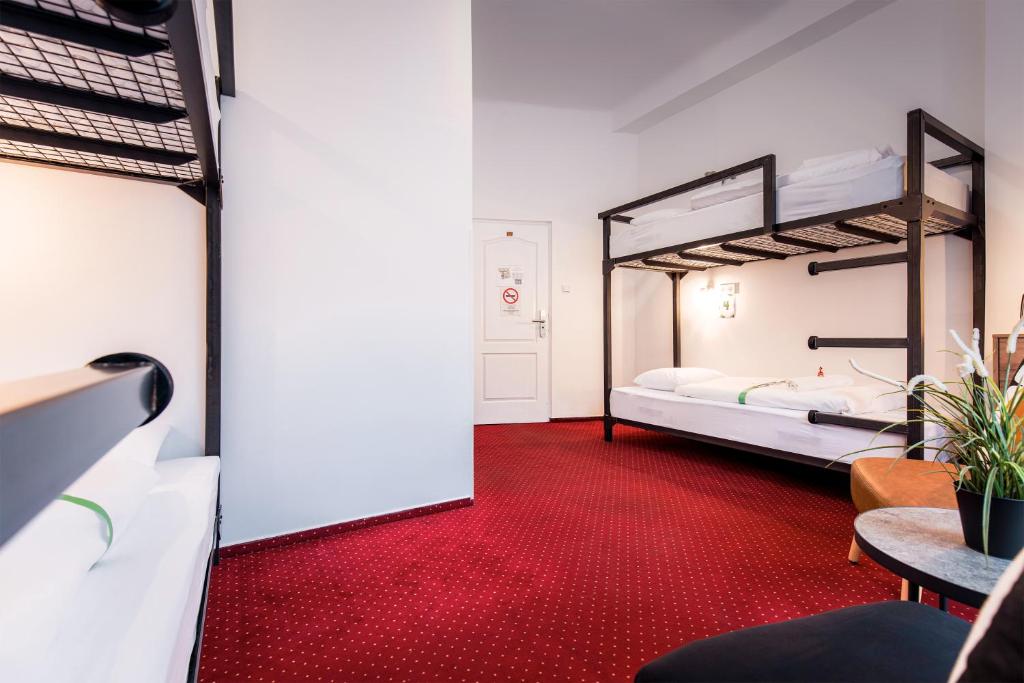 A bed or beds in a room at Maverick Downtown