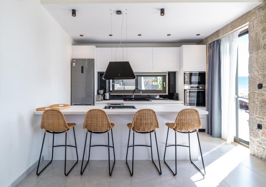 Η κουζίνα ή μικρή κουζίνα στο Smirties Villas