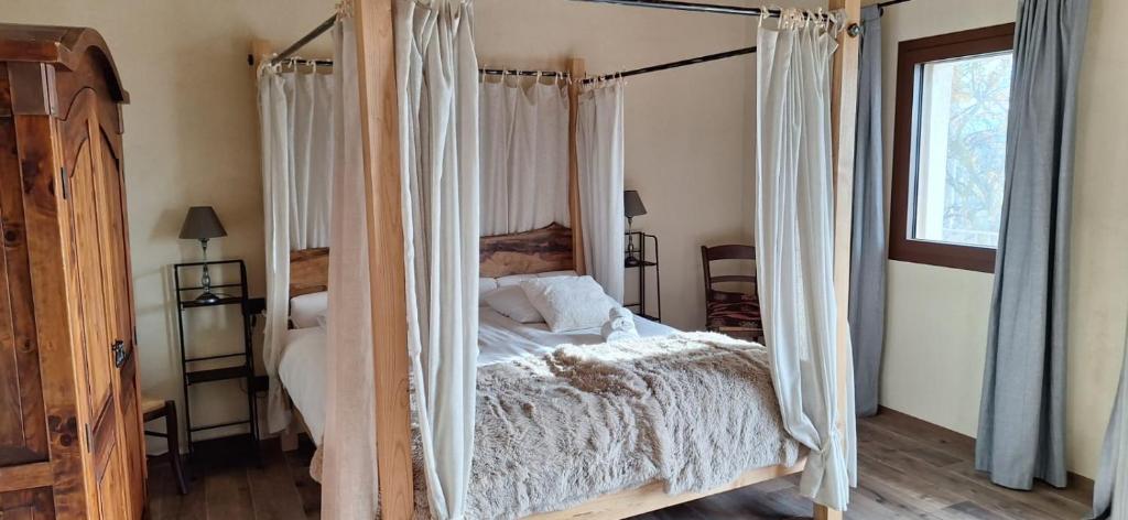 Postel nebo postele na pokoji v ubytování Agriturismo La Pina
