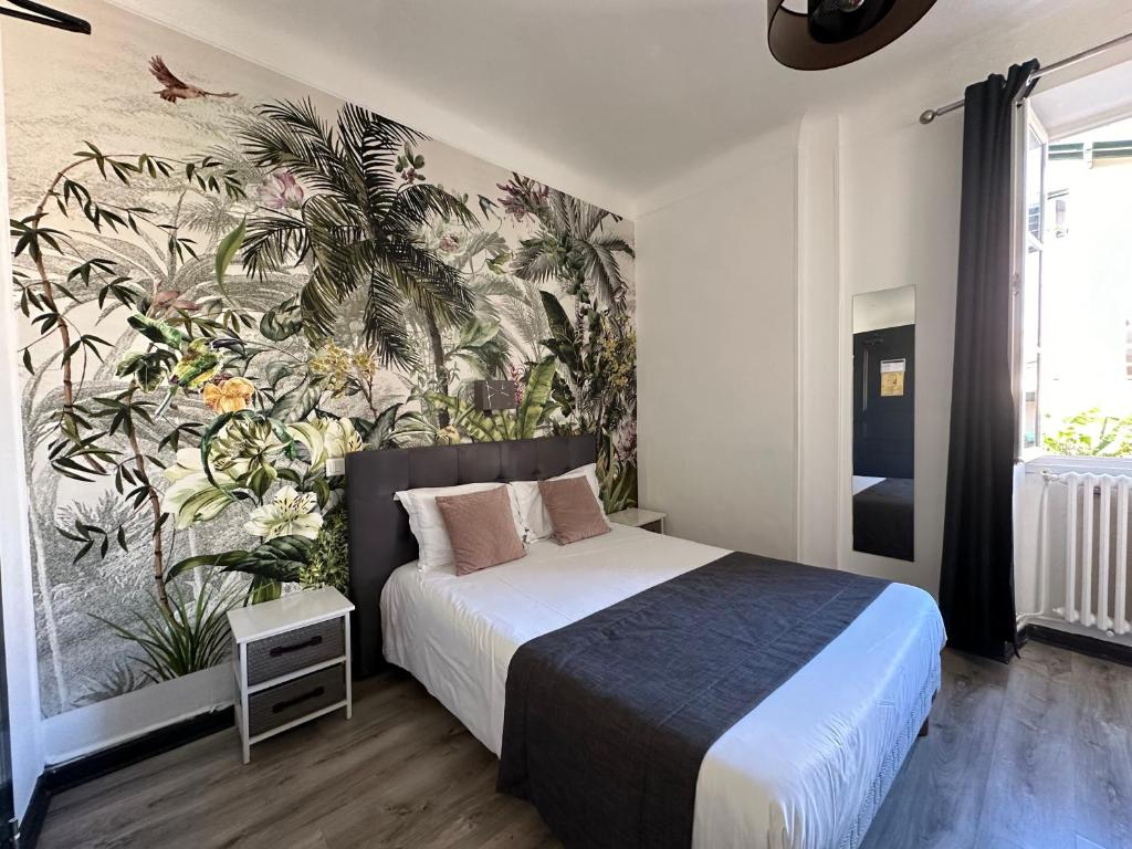 Postel nebo postele na pokoji v ubytování Hôtel Parc Mazon-Biarritz