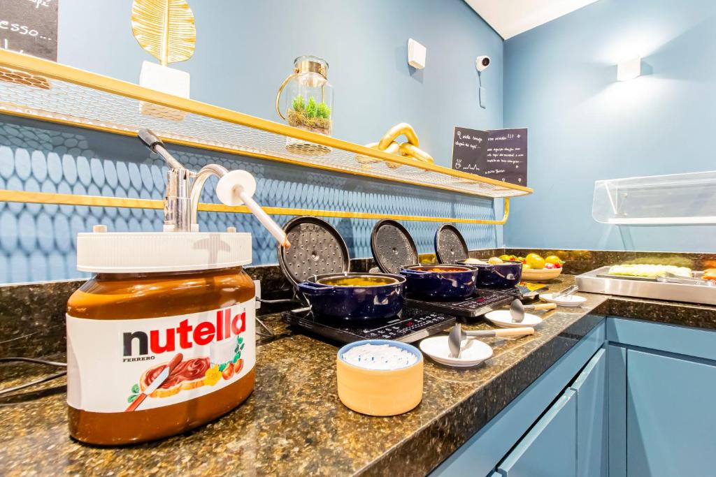 Kuchyň nebo kuchyňský kout v ubytování Hotel Euro Suite Curitiba Batel By Nacional Inn