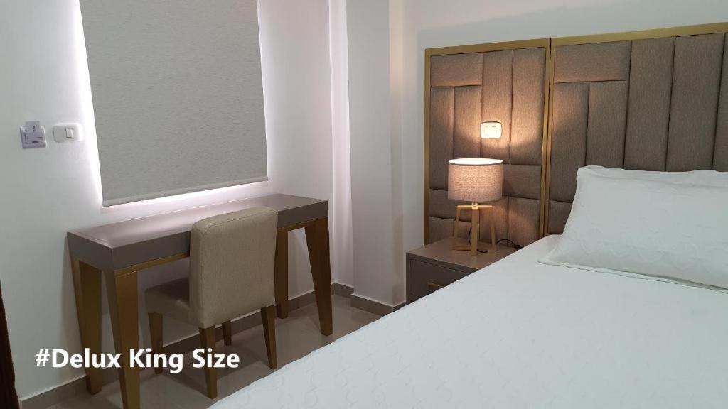 Una cama o camas en una habitación de Hotel Valledupar Plaza