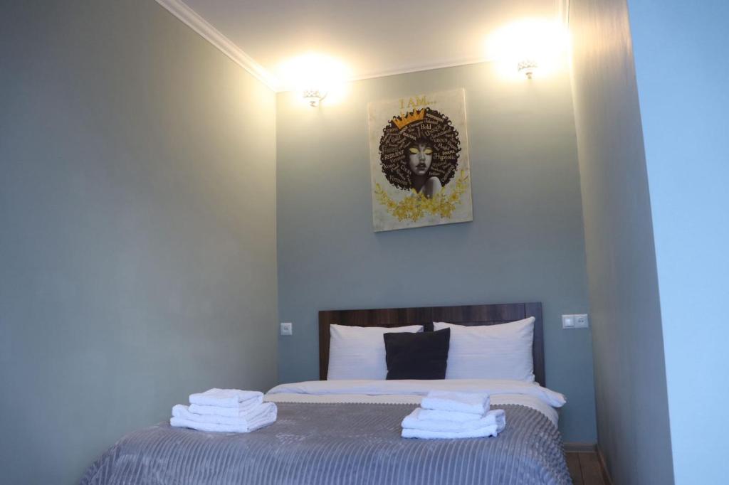 Postel nebo postele na pokoji v ubytování Guesthouse Relax in Kazbegi