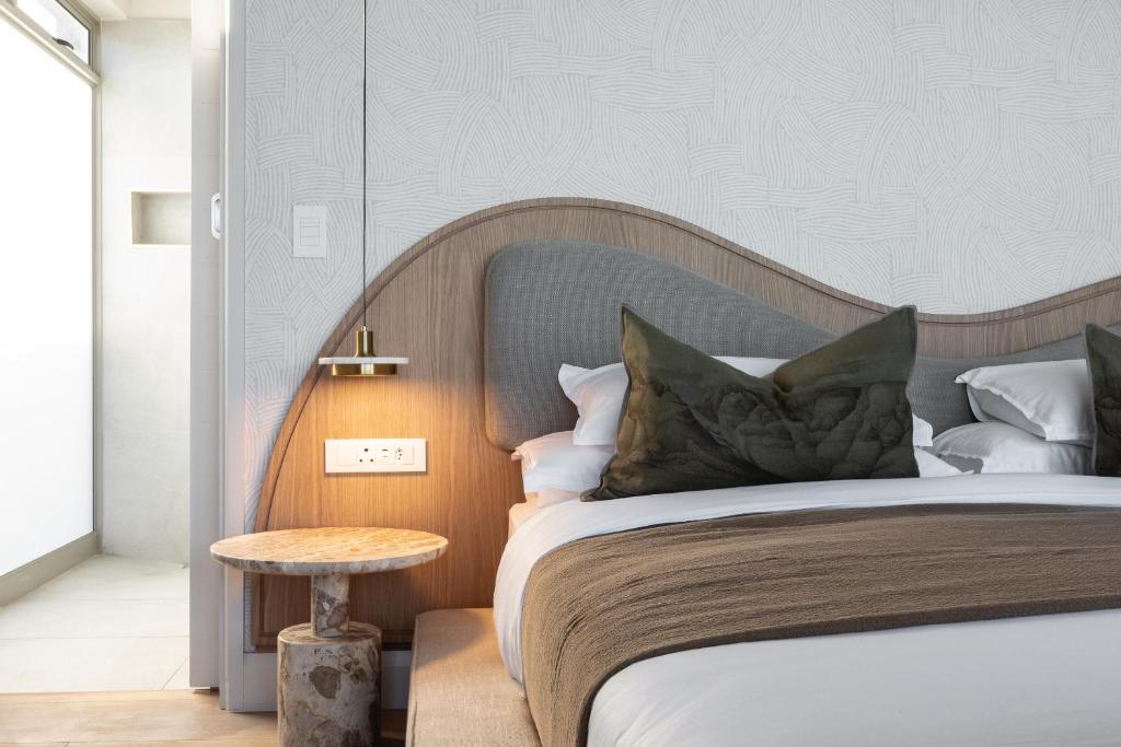 Letto o letti in una camera di Escape to the Beach