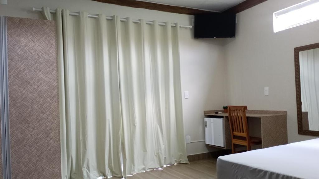 Postel nebo postele na pokoji v ubytování Pousada São José na Canastra