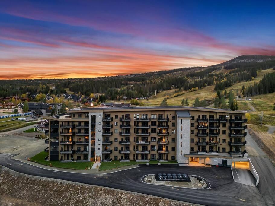 an aerial view of a large apartment building at New Nice apartment Trysil alpine lodge with the lift right outside in Trysil