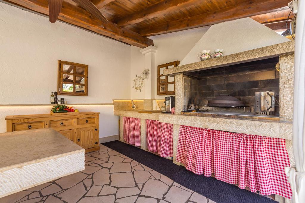 Kuchyň nebo kuchyňský kout v ubytování Guest House Antonella