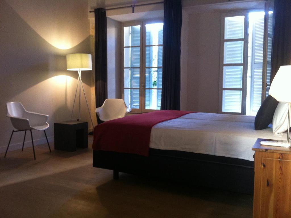 Voodi või voodid majutusasutuse L'Observance Bed & Breakfast toas