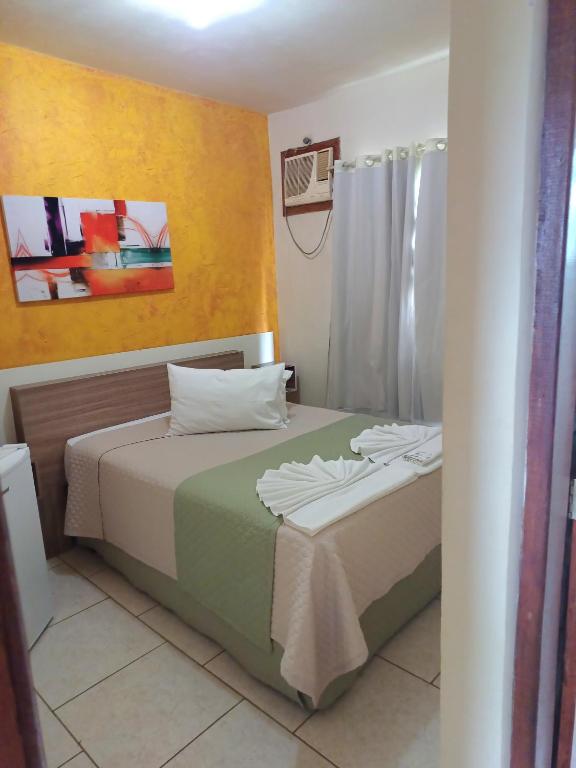 Postel nebo postele na pokoji v ubytování JSA Hotel