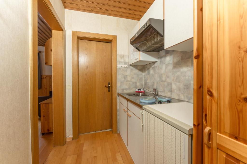 Kuchyňa alebo kuchynka v ubytovaní Winklhütte