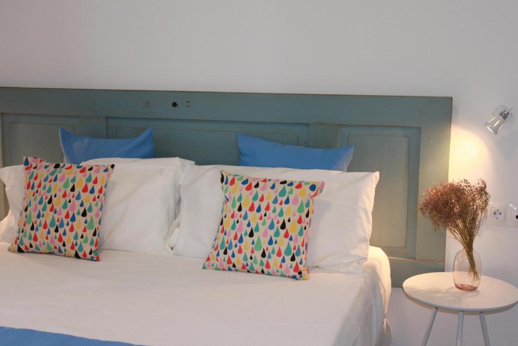 Posteľ alebo postele v izbe v ubytovaní Guadalupe Hotel Boutique