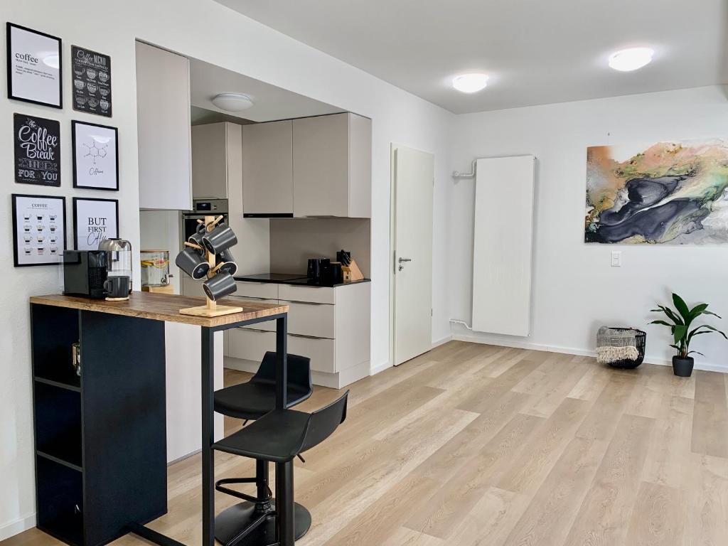 Kuchyň nebo kuchyňský kout v ubytování EVA o Wellnessoasis o Montainview o Pizzaoven o