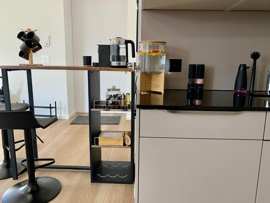 Kuchyň nebo kuchyňský kout v ubytování EVA o Wellnessoasis o Montainview o Pizzaoven o