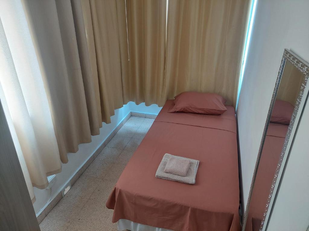 Postel nebo postele na pokoji v ubytování Habitaciones privadas en un departamento encantador