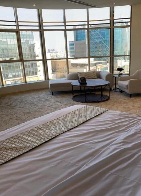 Postel nebo postele na pokoji v ubytování The S Hotel - jeddah - prince sultan street - فندق ذا اس - جده - طريق الامير سلطان