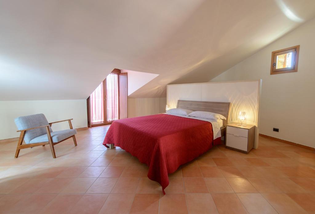 Posteľ alebo postele v izbe v ubytovaní La Bifora b&b