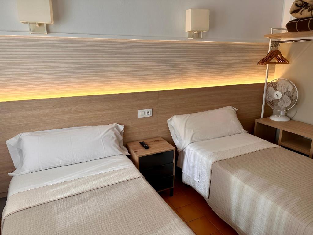 Postel nebo postele na pokoji v ubytování Can Setmanes by CozyCatalonia