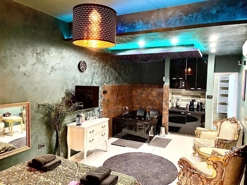 TV a/nebo společenská místnost v ubytování Spa Apartments UTOPIA