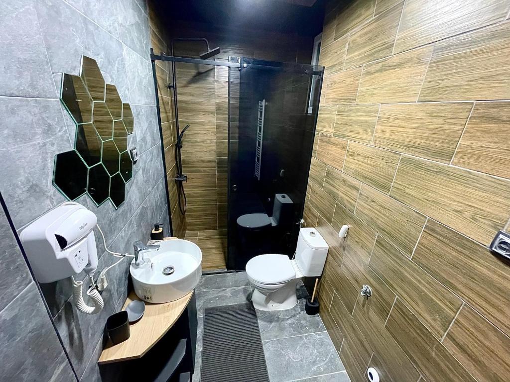 Koupelna v ubytování Spa Apartments UTOPIA