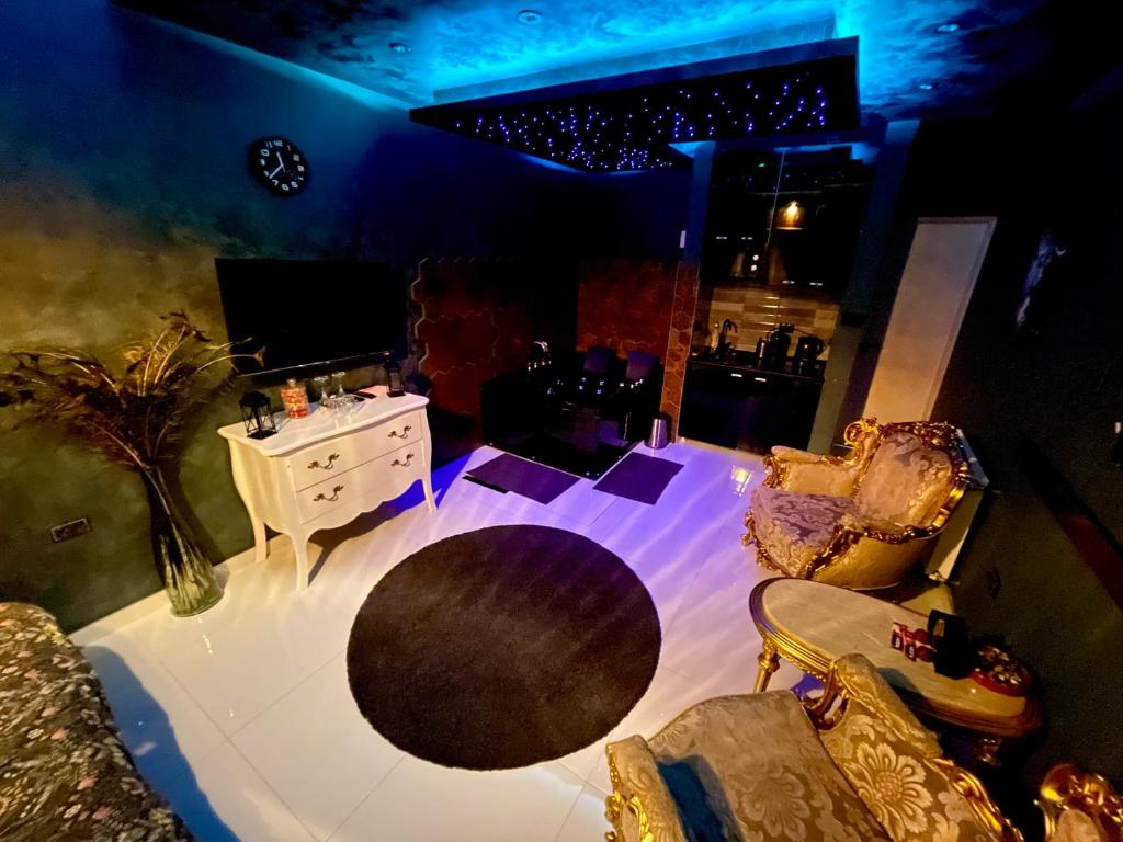TV a/nebo společenská místnost v ubytování Spa Apartments UTOPIA