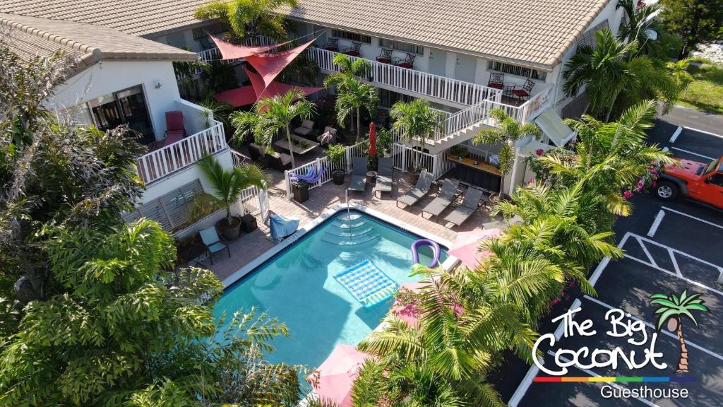 an aerial view of a hotel with a swimming pool at The Big Coconut Guesthouse - Gay Men's Resort in Fort Lauderdale