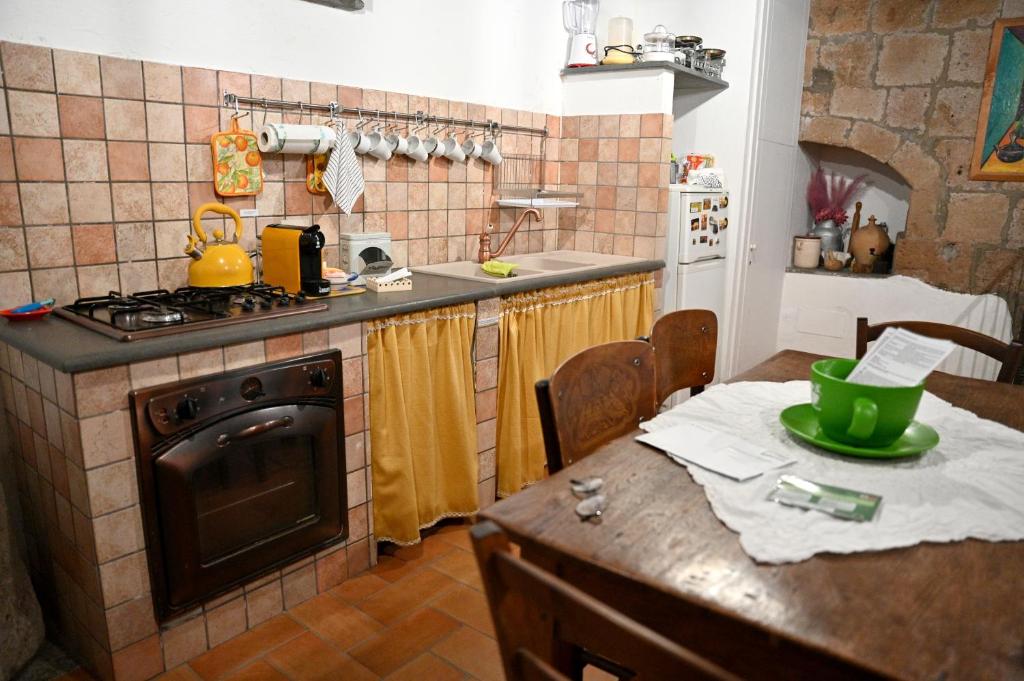 Kuchyň nebo kuchyňský kout v ubytování Palazzo Granaroli