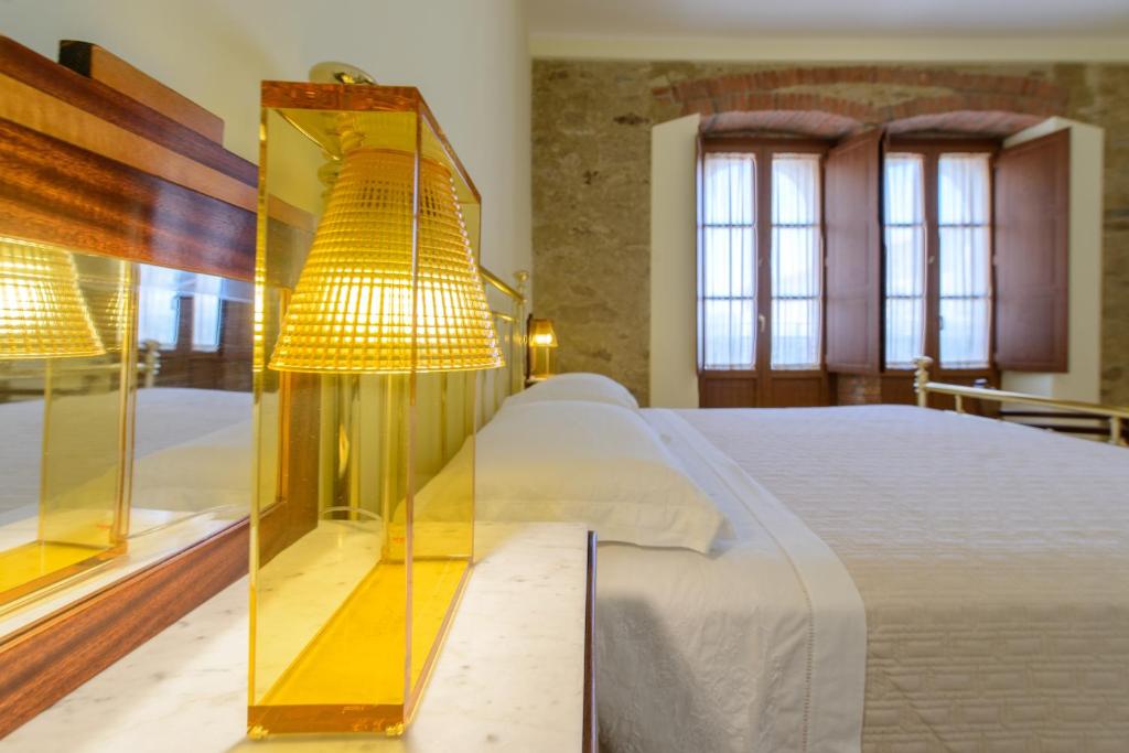 Posteľ alebo postele v izbe v ubytovaní La Bifora b&b