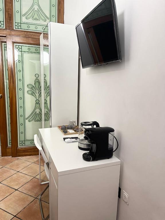 TV a/nebo společenská místnost v ubytování House Caracciolo by Loveinthetravel