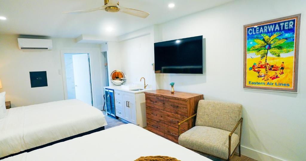 Postel nebo postele na pokoji v ubytování Ivory Sands Beach Suites