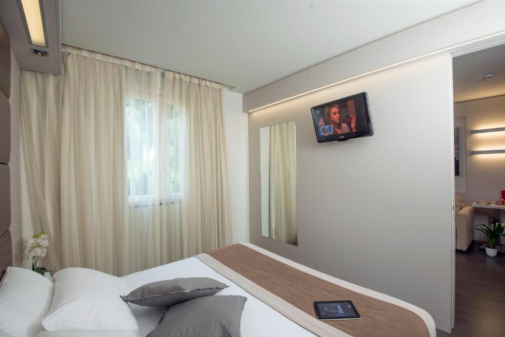 TV a/nebo společenská místnost v ubytování As Hotel Dei Giovi
