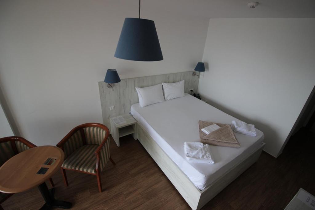 Postel nebo postele na pokoji v ubytování Hotel La Terrazza